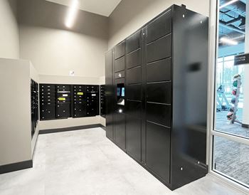 A bunch of lockers in a room with a window